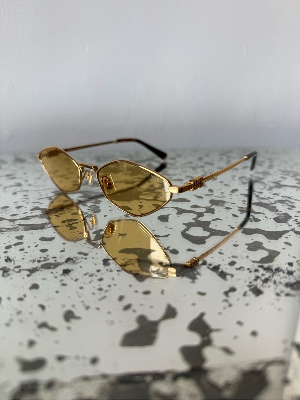 Miu Miu Sunglasses with Yellow Lenses